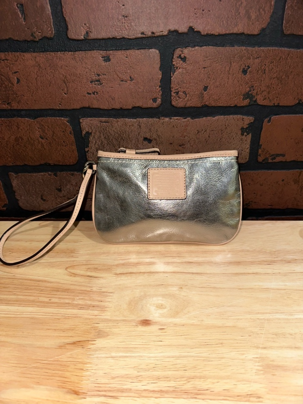 Coach Silver Metallic Wristlet with Nude Trim